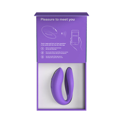 Purple We-Vibe Sync O couples vibrator displayed inside open packaging with app connection instructions.