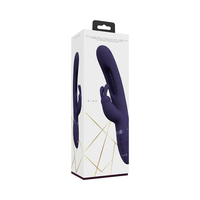 Packaging box of Vive Mika rechargeable triple motor vibrating rabbit in dark purple with gold geometric accents.
