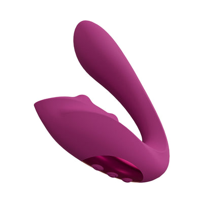 Purple rechargeable triple motor vibrator with curved design and control buttons on base.