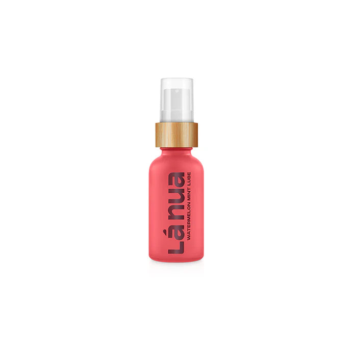Pink pump bottle of La Nua Watermelon Mint water-based lubricant with wooden accent cap on white background