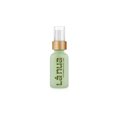 La Nua Cucumber Aloe water-based lubricant in a green glass spray bottle with bamboo cap.