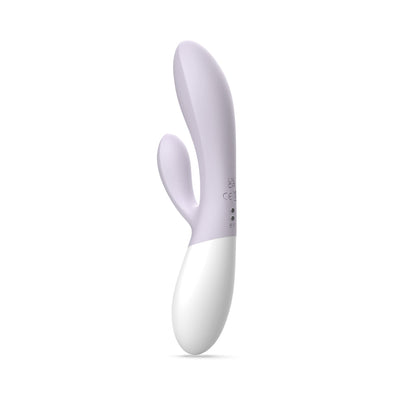 Purple and white dual-stimulation rabbit vibrator with smooth curved design and ergonomic handle.