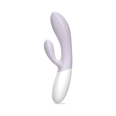 Sleek purple and white dual-stimulation rabbit vibrator with ergonomic design and smooth silicone finish.