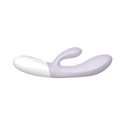Purple and white dual-stimulation rabbit vibrator with smooth curved design and ergonomic handle.