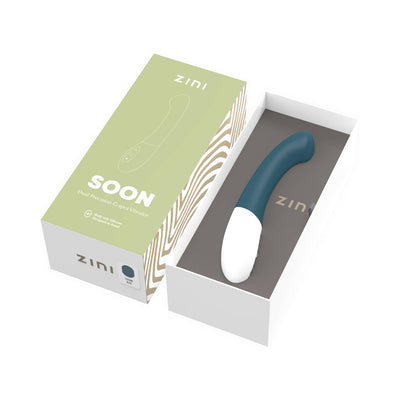 Zini Soon Legion Blue dual precision G-spot vibrator in sleek curved design with white base, displayed in open packaging box.