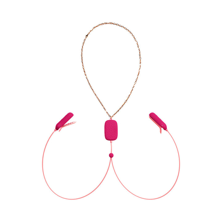 Pink OhMiBod Sphinx Bluetooth app-controlled wearable vibrating nipple clamps with gold chain and silicone clamps.