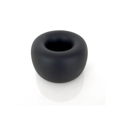 Black liquid silicone ball stretcher ring with a smooth, rounded design and a hollow center.