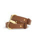 Tan leather Crave ICON Cuffs with polished 24kt gold hardware and adjustable straps on white background.