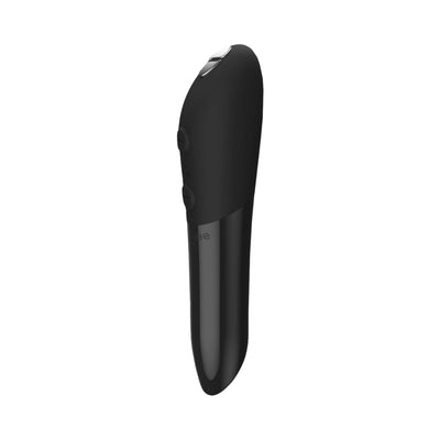 Sleek black We-Vibe Tango X bullet vibrator with ergonomic design and smooth silicone finish.