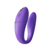 Purple We-Vibe Sync Go couples vibrator with ergonomic design and textured inner arm for dual stimulation.