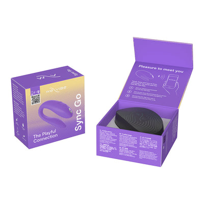We-Vibe Sync Go couples vibrator in purple with packaging box and open travel case showing product inside and app instructions.