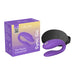 Purple We-Vibe Sync Go couples vibrator with travel case and packaging box on white background.