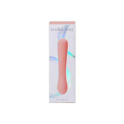 iroha mai TOKI personal care device in soft pink with sleek, ergonomic design on white packaging with iridescent accents