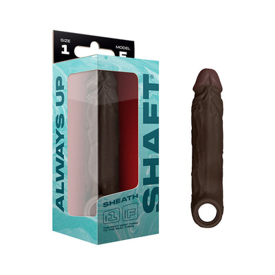 Model F Shaft Sheath Size 1 in dark brown liquid silicone with textured design and finger loop, shown with packaging box.