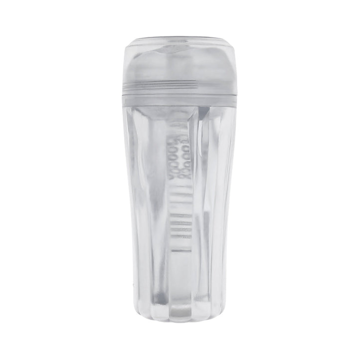 Clear textured stroker with ergonomic grip and removable cap for easy cleaning and secure storage.