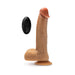 Tan realistic silicone dildo with suction base and black wireless remote control on white background.