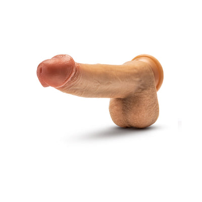 Realistic tan silicone dildo with suction cup base and detailed texture, 8.5 inches long by Dr. Skin.