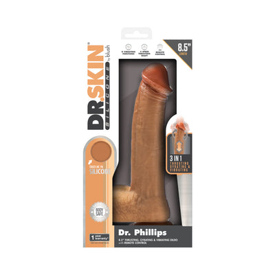 Tan 8.5-inch Dr. Skin Silicone Dr. Phillips realistic dildo with remote-controlled thrusting, gyrating, and vibrating functions in packaging.