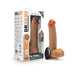 Tan 8.5-inch realistic silicone dildo with suction base and wireless remote control next to product packaging.