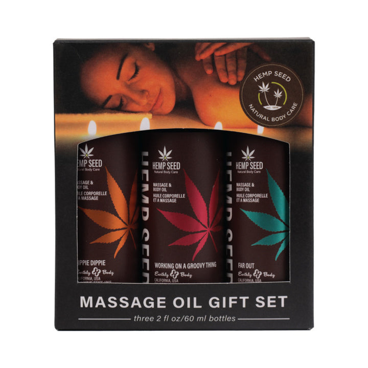 Earthly Body Hemp Seed Massage Oil Trio Gift Set with three 2 oz bottles in colorful leaf design packaging