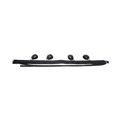 Black adjustable restraint system with four padded cuffs and multiple D-ring connectors for versatile positioning.
