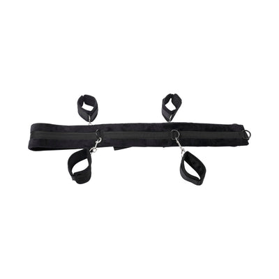 Black adjustable restraint system with padded straps and four connected cuffs for versatile positioning.
