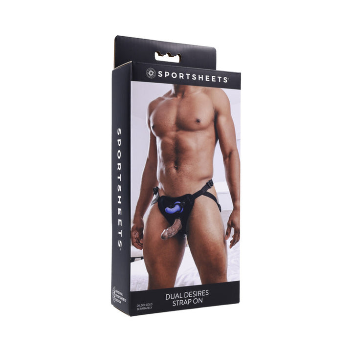 Packaging of Sportsheets Dual Desires Strap On featuring a male model wearing the adjustable black harness with dual O-rings.