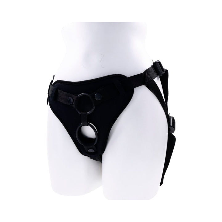 Black adjustable dual O-ring strap on harness with padded front on white mannequin.