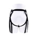 Black adjustable strap-on harness displayed on a white mannequin from the back.