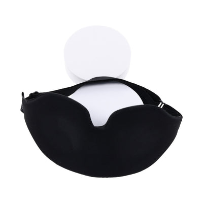 Black Sportsheets Blackout Blindfold with adjustable elastic strap and contoured memory foam design on white background.