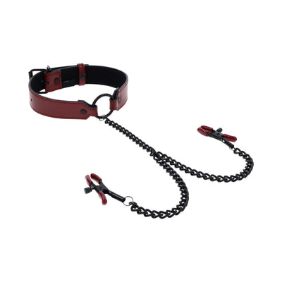 Red and black adjustable collar with attached black chain and red-tipped nipple clamps on white background.