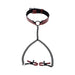 Red and black adjustable collar with attached black chains and red-tipped nipple clamps on white background.
