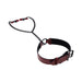 Red and black adjustable collar with attached chain leading to two red-tipped nipple clamps on a white background.