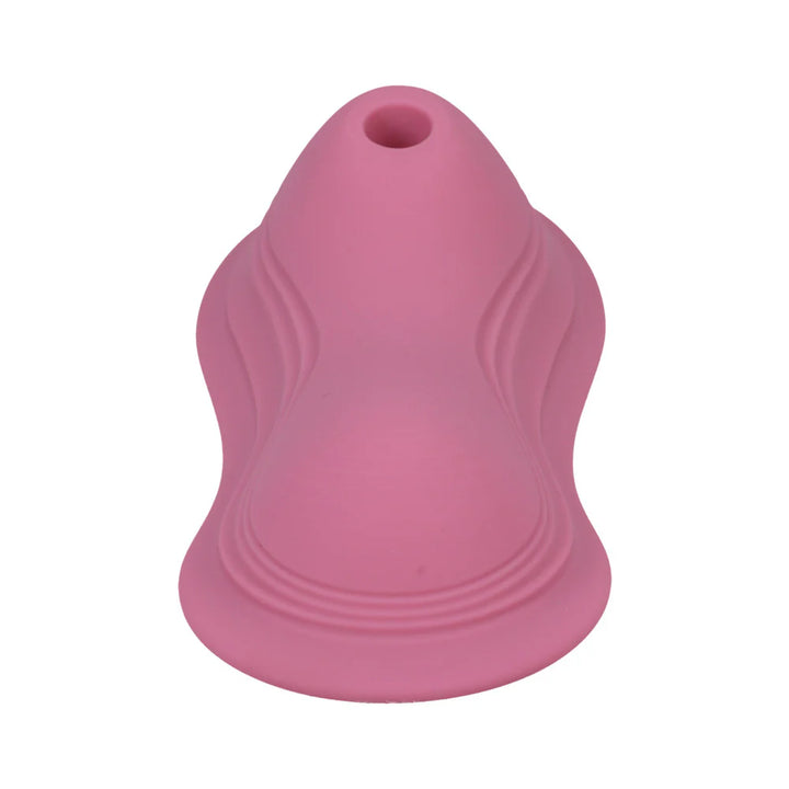 Dusty pink iRide Pleasure Seat Suck with textured silicone surface and central suction opening, designed for dual stimulation.