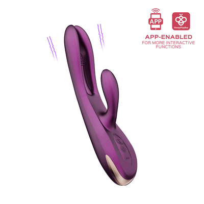 Purple app-controlled rabbit vibrator with hollowed shaft and flexible clitoral arm, featuring multiple vibration and tapping modes.