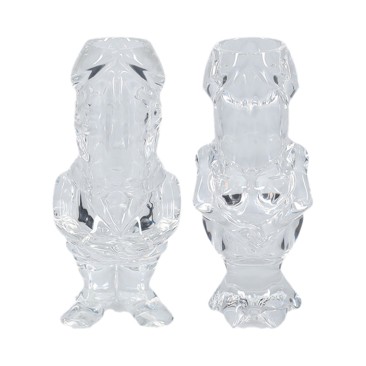Clear tall shot glasses shaped like playful cartoon characters, designed as a humorous couples set.