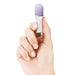 Hand holding a compact Jimmyjane Hello Touch Pro fingertip massager with a lavender silicone tip.