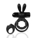 Black double vibrating ring with bunny ears and matching remote control ring on white background.