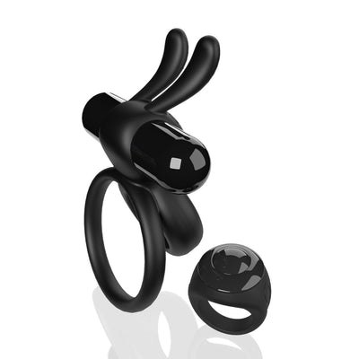 Black double-ring vibrating device with bunny ear design and matching remote control ring on white background.