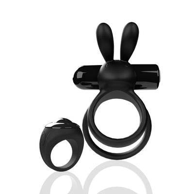 Black silicone remote controlled vibrating double ring with bunny ears and matching remote ring on white background.