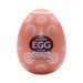 Tenga EGG Gear Stronger in orange with gear pattern, compact textured pleasure sleeve in egg-shaped packaging.