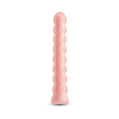 Pure Joy Peach vibrator in soft peach color with a textured, rounded bead design and smooth silicone finish.