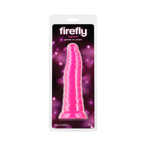 Pink glow-in-the-dark textured silicone dildo in clear packaging with Firefly branding and purple light effects background