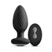 Black textured silicone anal plug with flared base and matching remote control with two buttons.