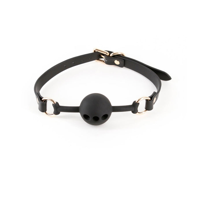 Black breathable ball gag with adjustable strap and gold-tone hardware on white background.