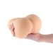 Hand holding a tan-colored textured stroker from the Barely Legal Leilani series against a white background.