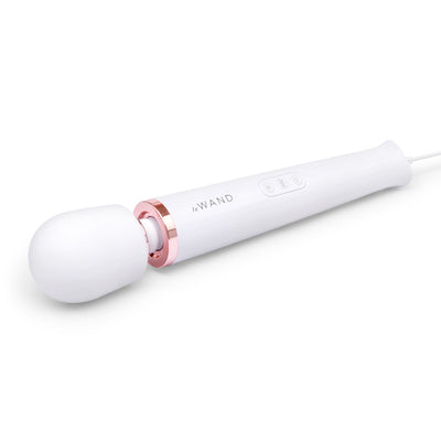 Le Wand Plugin Sky White vibrating massager with rose gold accent and long power cord on white background.