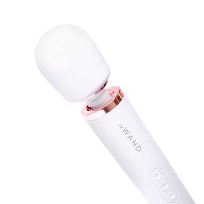 Le Wand Plugin Sky White vibrating massager with smooth rounded head and rose gold accent on white background.