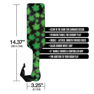 Glow-in-the-dark paddle with green cannabis leaf design, smooth edges, black wrist loop, 14.37 by 3.25 inches for sensory play.
