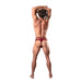 Rear view of a male model wearing a burgundy strappy cutout thong with lace detailing against a white background.